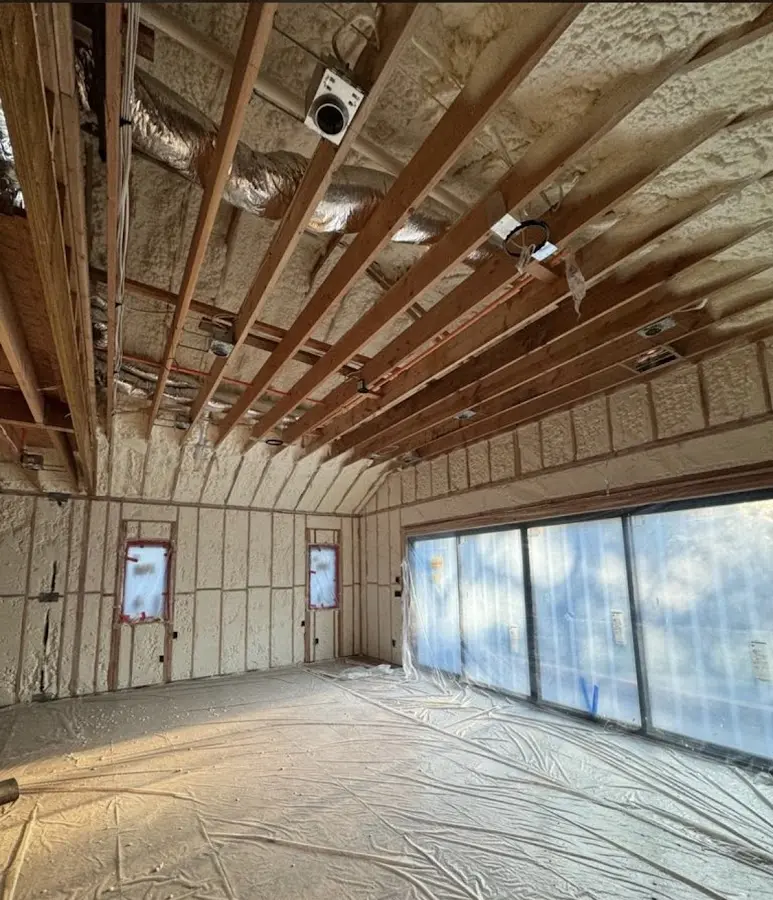 Interior walls and ceiling insulated with spray foam during new construction in West Bloomfield